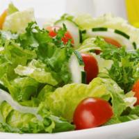 House Salad · Lettuce, tomatoes, onions.