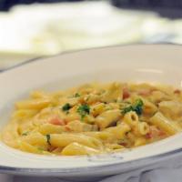 Penne Vodka · Tomato and vodka cream sauce