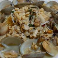 Linguini & Clams · linguini served with steamed clams  sauted with herbs and garlic on a white or red wine sauce