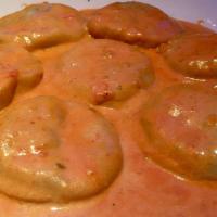Cheese & Spinach Ravioli · Stuffed with ricotta and spinach, served with creamy pink sauce or fresh tomato