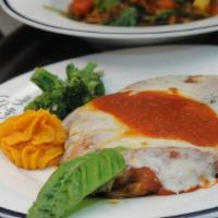 Veal  Parmesan · Veal breaded topped with marinara sauce and cheese. Served with side of brocolli, penne past...