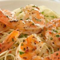 Shrimp Scampi · Jumbo shrimp over white wine butter sauce  over spaghetti