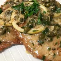 Veal Picatta · Lemon white wine sauce, capers and artichoke hearts. Served with a side of brocolli, penne p...