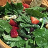 Barracas · Spinach, goat cheese, strawberries, walnuts, cucumbers, avocado, black olives, balsamic dres...