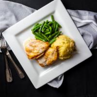 Pub Chicken · Fresh chicken breasts seasoned and pan fried served with mashed potatoes, green beans, and d...