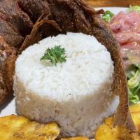 Snapper · Popular. Served with rice, fried green plantains and salad.