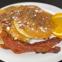 Bacon Praline Pancakes · Our Classic Buttermilk Pancakes filled with Applewood-Smoked Bacon and Toasted Pecans, toppe...