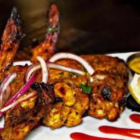 Blue India Wings · Chef's spice blend marinated tandoori chicken wings, served with curry ranch.  (Baked, not f...