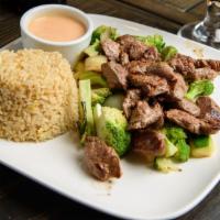 Hibachi Steak · Entrees come with fried rice mixed vegetables including cabbage broccoli onion and zucchini.