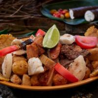 Picada Colombiana · Sample platter with cuts of Colombian sausage, steak, fried chicken, pork find, blood sausag...