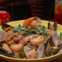 Arroz Chaufa De Mariscos · Chinese style Peruvian fried rice with seafood.
