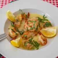 Broiled Seafood Platter · Fish, shrimp, and scallops in garlic and oil, white wine sauce.