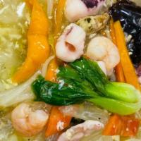 Woolmen (울면) · Starch soup-based noodle with shrimp, squid, mussel, eggs, and vegetable.