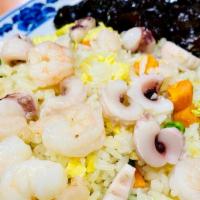 Seafood Fried Rice (해물볶음밥) · Fried rice with squid , shrimp and egg.
