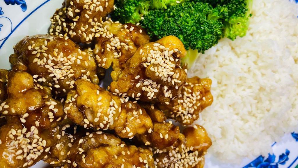 Sesame Chicken With Rice (세서미치킨) · Deep-fried chicken glazed in sweet and savory sauce topped with sesame seeds.