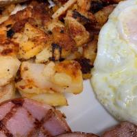 Breakfast Favorites Pork Roll Or Canadian Bacon · Pork roll or Canadian bacon with two eggs choice of side and bread.