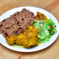 Curry Chicken Dinner · Served with rice and peas or white rice, plantains, steamed vegetables.