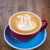 Cappuccino* · One part espresso, half steamed milk foam, and half milk.