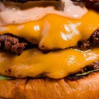Cartel Double Burger W/Fries And Drinks · Two all-beef patties topped with Signature “Cartel Sauce”, two slices of melted American che...