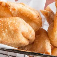Crab Rangoons · Most Popular. Seafood and Cream cheese filling wrapped in a wonton shell and deep fried. Ser...
