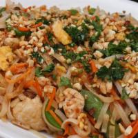 Pad Thai · Traditional Pad Thai with rice noodles, bean sprouts, carrots, pea pods, green onions, jalap...