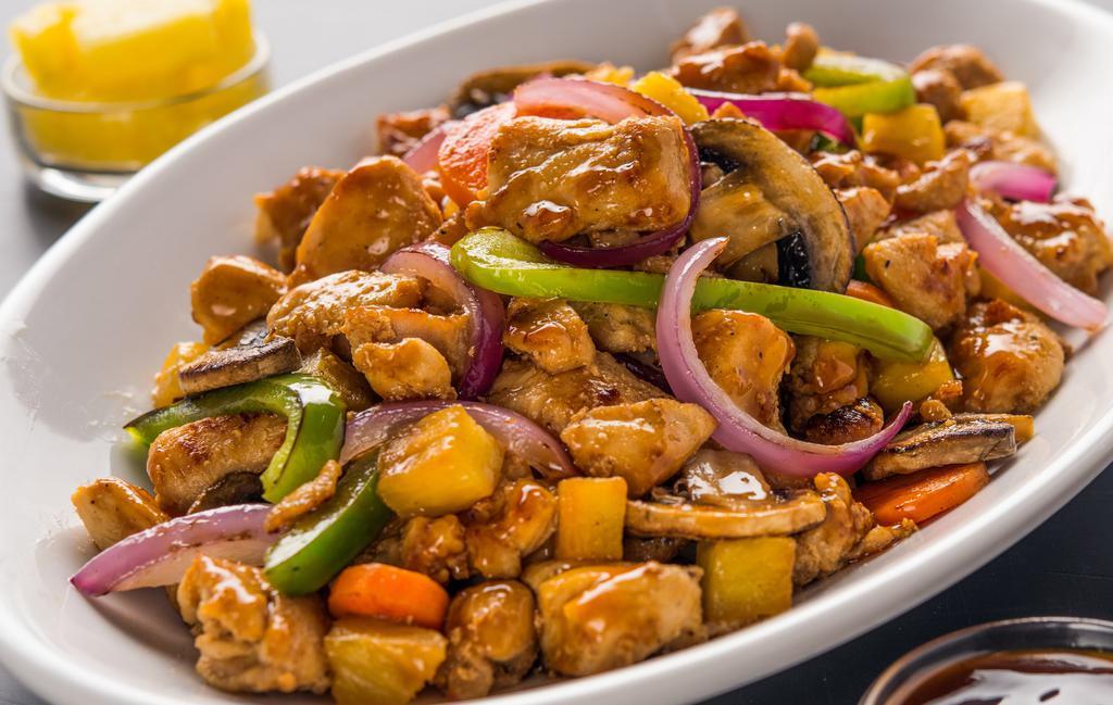 Sweet & Sour Bowl · Pork or chicken, mushrooms, onions, pineapple, pea pods, green peppers and carrots. With sweet and sour sauce, a dash of ginger, chopped garlic and bd's seasoning.