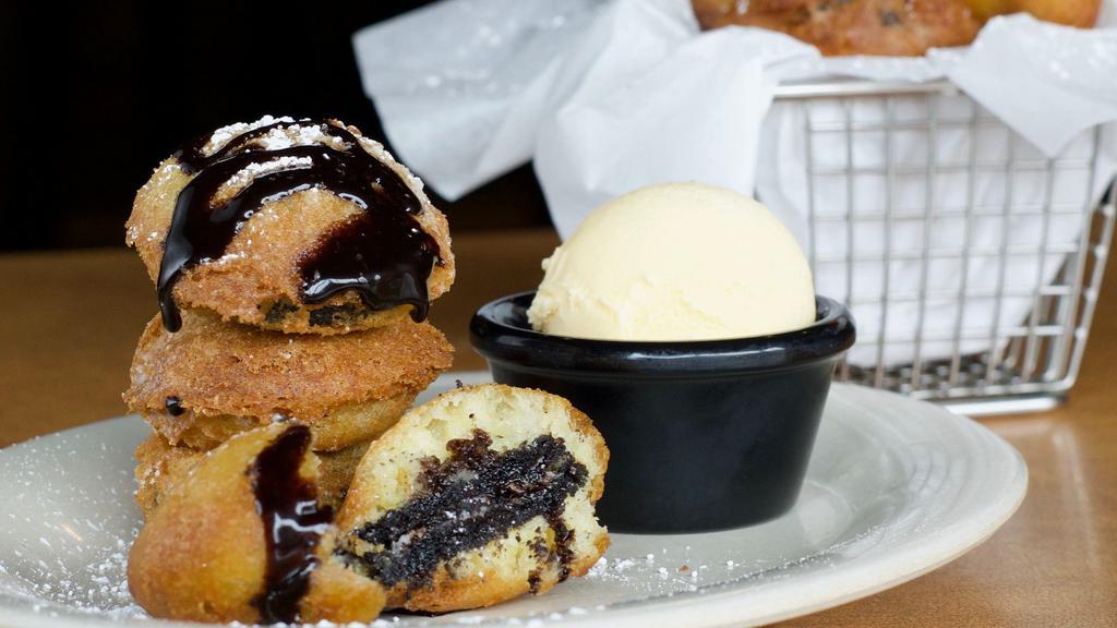Fried Oreo'S · Four Oreo cookies deep fried to perfection and served with Hershey's hot fudge.