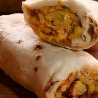 Breakfast Burrito · Ham, sausage, green peppers, onions, tomatoes, mushroom and cheese wrapped in a fresh tortil...