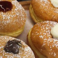 Donut · Filled with sweetened cream, marmalade or chocolate.