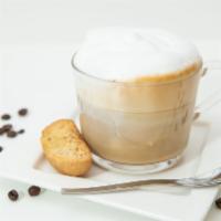Cappuccino · Espresso coffee topped with frothed hot milk.