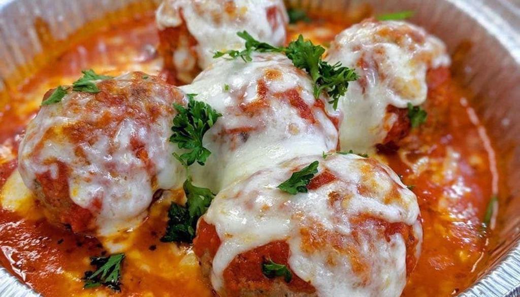 Meatballs (5) · Five mini chicken meatball,marinara sauce and melted cheese Garnished with parsley