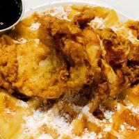 Chicken & Waffle · Chicken breast breaded to order and fried over a Belgian waffle, topped with powdered sugar,...