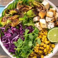 Tofu Greens · arugula, chopped romaine, sweet corn, cucumbers, shredded cabbage, roasted Brussels, roasted...