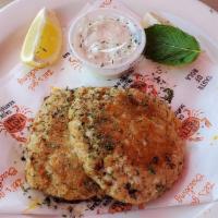 Crabcakes · 2 Jumbo lump crab cakes served with tartar sauce.