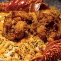 Lobster Mac & Cheese · Served in our creamy blend of cheese, scallions parmesan bread crumb, and toasted garlic bre...