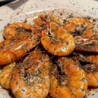 Nola Bbq Shrimp · BBQ shrimp in a buttery sauce served with garlic bread.