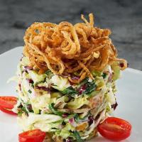 Ruth'S Chop Salad · Our original... julienne iceberg lettuce, baby spinach, radicchio, red onions, mushrooms, gr...
