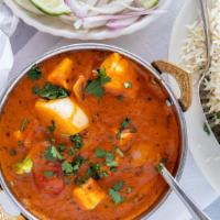 Paneer Tikka Masala · Homemade cottage cheese cubes, bell pepper, onion, and tomatoes cooked in kadai with chef's ...