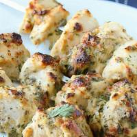 Malai Chicken Kabab With Rice · Creamy flavor mild chicken marinated in yogurt, herb, and spices. Skewer and grill on open f...