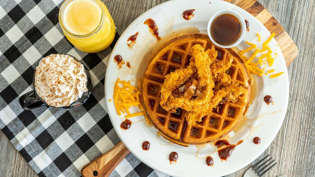 Crispy Chicken & Waffles Benedict · Crispy chicken, waffle and poached eggs.