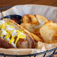 The Wisconsin · 1/4 brat marinated in craft beer in a toasted pretzel bun. Topped with raw onion and your ch...