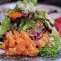 Sashimi Salad · Chef’s assorted fresh sashimi and avocado. Served over mixed greens with ginger citrus dress...