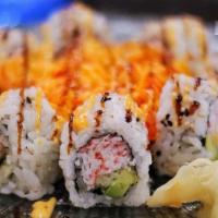 Super Volcano · California roll topped with toasted spicy shrimp, scallop, and crab mix.