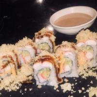 Yoshino · Shrimp tempura and crab roll topped with shrimp, spicy mayonnaise, eel sauce, and crunch.