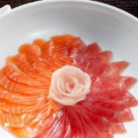Usuzukuri · Thin sliced Yellowtail, tuna, and salmon served with ponzu sauce.