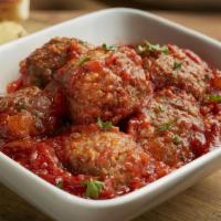 Piola’S Meatballs · Homemade beef and pork meatballs slow cooked in San Marzano tomato sauce, served with focacc...