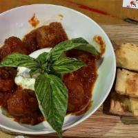 Meatballs & Burrata · Homemade beef and pork meatballs slow cooked in San Marzano tomato sauce and topped with bur...