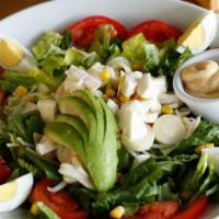 D’Annunzio Salad · Arugula, romaine lettuce, mozzarella fior di latte, hard-boiled eggs, avocado, hearts of pal...