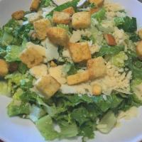 Caesar Salad · Romaine lettuce, shaved Grana Padano cheese, homemade croutons, homemade caesar dressing.
