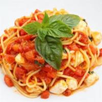 Spaghetti Crudaiola · Tomato sauce, diced tomatoes, mozzarella fior di latte, fresh basil.
